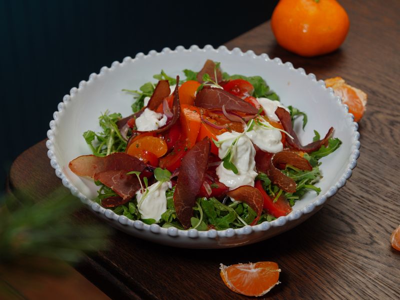 Arugula salad with prosciutto and shaved parmesan